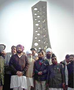 Punjab Chief Minister Amarinder Singh is seen along with PPCC President H.S. Hanspal after paying tributes to 66 Sikh martyrs at the martyrs memorial at Malerkotla on Saturday.