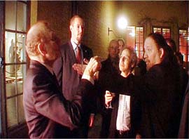 Israel's Ambassador to Sweden Zvi Mazel argues with artist Dror Feiler at Stockholms Museum of National Antiquities