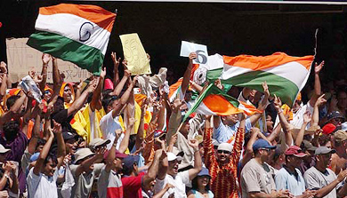 Indian cricket fans cheer their team during India's triangular series one-day match against Australia in Brisbane 