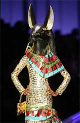 A model presents an ancient Egypt inspired creation by British designer John Galliano 
