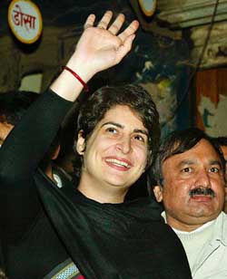 Priyanka Vadra, daughter of Congress President Sonia Gandhi, waves to her supporters in Amethi on Wednesday.