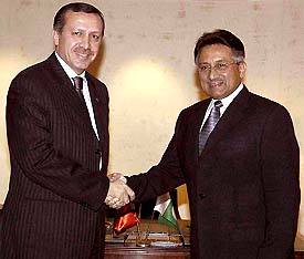 Pakistan President Gen Pervez Musharraf shakes hand with Turkish Prime Minister Recep Tayyip Erdogan