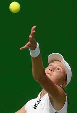 Russia's Dinara Safina serves during her second round 7-5, 6-3 win over South Africa's Amanda Coetzer