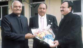 Delhi and District Cricket Association vice-president C K Khanna and sports secretary Sunil Dev felicitating former BCCI President P M Rungta on Friday.