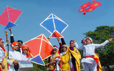 Students from various city schools enjoy kite flying at the inauguration of the three-day Basant Utsav at Leisure Valley 