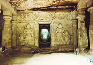 Dvarpals on either side of the door opening into the prayer hall at Jogeshwari