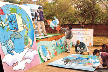 Final touches are being given to a tableaux of the Department of Information, Science and Technology, Chandigarh Administration, on the eve of the Republic Day parade
