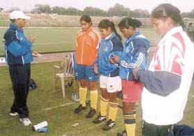 The Indian women’s hockey team players are all ears as chief coach M.K. Kaushik gives vital tips to the team