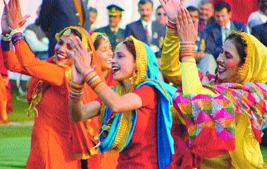 Folk dancers regaling the Brazilian President with their numbers 
