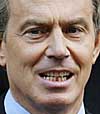 Britain's Prime Minister Tony Blair leaves Downing Street for the House of Commons in London on Wednesday