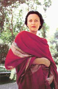 A woman shows off a shahtoosh shawl