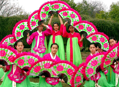 Students from Jeong Myung Girls High School, Mokpo, South Korea, perform fan dance as part of an exchange programme with Paragon Senior Secondary School