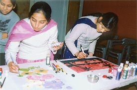 Students take part in a painting competition during Ectopia-04 at the Dayanand Medical College and Hospital