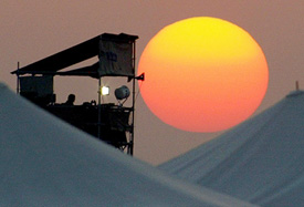 A Dutch soldier sits on guard at a watchtower in Samawa, southern Iraq, on Friday