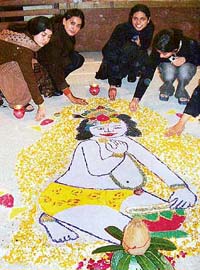 Students make a rangoli during ‘Ectopia-04’ at Dayanand Medical College and Hospital in Ludhiana on Saturday.