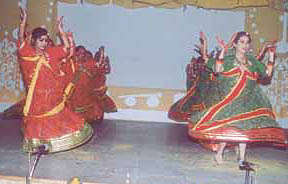 Children performing a folk dance during the Vasantutsav celebrations at Alhcon International School  