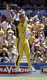 Australias Brett Lee reacts after taking the wicket of Indias V.V.S. Laxman