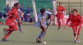 A tense moment in the hockey match between India and Malaysia in the fifth womens Asia Cup