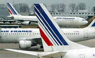 Air France planes are parked at the Charles de Gaulle airport, Paris, after the cancellation of Mondays direct flight between Paris and Washingtons Dulles Airport
