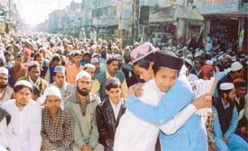 Two youngsters embrace each other while exchanging greetings on the occasion of Id in Ludhiana on Monday
