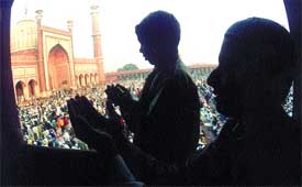 Muslims offer namaz on the occasion of Id at Jama Masjid in the Capital