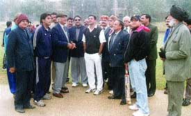 Ramakant Goswami conducts the toss to inaugurate the Goswami Girdhari Lal Memorial Cricket Tournament