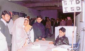 Mr Lalji Singh at his PCO in the new District Courts Complex in Ludhiana