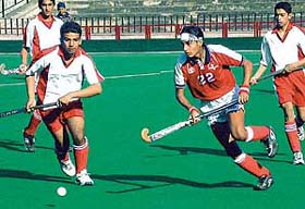 The teams of Chandigarh Hockey Academy (Red) and St Stephens School, Sector 45, play their first semi-final of the six-a-side hockey tournament at Sector 42 Hockey Grounds
