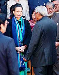 Prime Minister Atal Bihari Vajpayee with Congress President Sonia Gandhi before a group photograph at Parliament House in New Delhi 