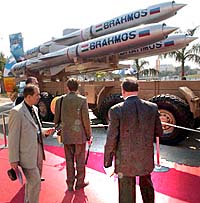 A group of foreign visitors takes a look at the Brahmos, Indian cruise missile, during the Defexpo India 2004 at Pragati Maidan in New Delhi.