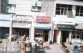 Almost the entire row of single-storey built up booths has been converted into double-storeyed buildings in gross violation of allotment norms and building bylaws in Kidwai Nagar