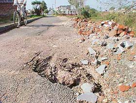 A road which was constructed three months ago needs repairs in Janta Nagar at Kharar