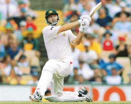 Australias captain Steve Waugh hits the ball and is caught out for 80 runs