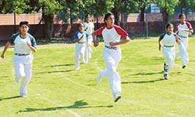 Students of Saupins School take part in a 200-metre race at the Sports Complex, Sector 46, Chandigarh, on Saturday