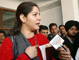Geeta Grewal, daughter-in-law of Mr Bhupinder Singh Hooda, Leader of Opposition in Haryana Assembly, talks to mediapersons outside of a court in Ambala
