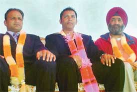  Kabaddi player Inderjit Phullanwal, hockey star Jugraj Singh and Tribune Chief of Bureau Prabhjot Singh, who were honoured on the occasion of the annual sports festival at Jarkhar village, near Ludhiana