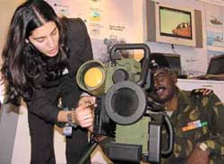 An armyman trying to get the hang of the new generation Multi-Purpose Missile System (Spike) at the Israel pavilion during the Defexpo India 2004 in the Capital.