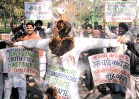 Congress workers protesting against the BJP-led NDA government in the Bofors issue at Parliament Street in the Capital on Saturday.