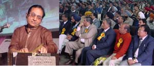 An employee of UCO Bank sings a bhajan at its general body meeting in Ludhiana on Sunday.
