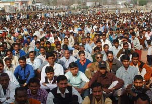 Members of various employee unions hold a protest rally organised by CITU at Giaspur village in Ludhiana on Sunday.