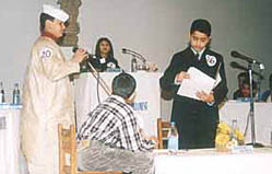 Young parliamentarians responding to the oppositions questions.
