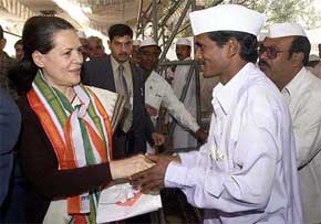 Congress President Sonia Gandhi interacts with Seva Dal workers