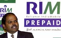 Mr V.G. Somasekhar, Reliance Infocom head of business for southern India, addresses a conference on the launch of its pre-paid services, in Chennai 