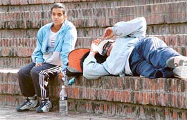 My job is over: Ramesh Krishnan  is  seen relaxing after her daughter Gayatri lost to Yana of Israel in straight sets in the first round of the singles event in the ITF junior tennis meet.