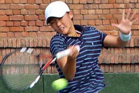 Shin Jung Yoon of Korea in action on the opening day of the ITF Junior Circuit Grade 3 Tennis tournament 