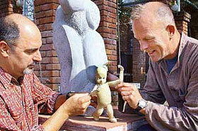 Andrew Hansen of Australia and master puppeteer from India, Dadi Pudumjee, share creative ideas during the special puppet making workshop that began at Kalagram