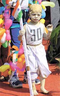 A child during a fancy dress show on the occasion of 93rd Anniversary of Corps of Signals at Army HQ in the Capital