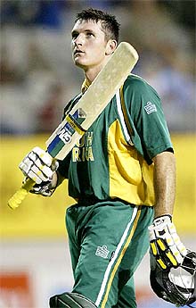 South African captain Graeme Smith watches a replay of his dismissal 