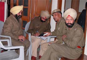 Policemen at the scene of robbery in New Janata Nagar, Shimla Puri, in Ludhiana