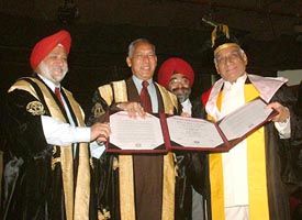 Justice O.P. Verma, Governor, Punjab, confers honorary doctorate degree on Yash Chopra